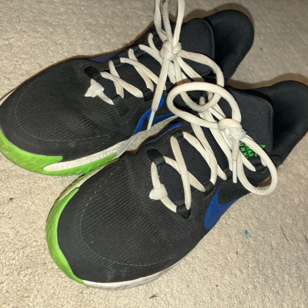Nike Kids Black Sneakers with Blue and Green Accents
